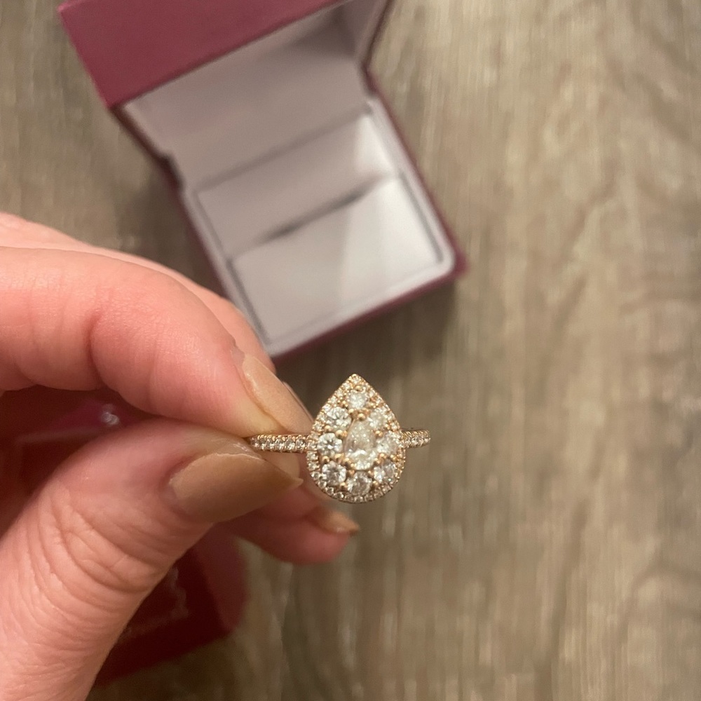 14kt diamond ring. Purchased at Helzberg and only wore one time.